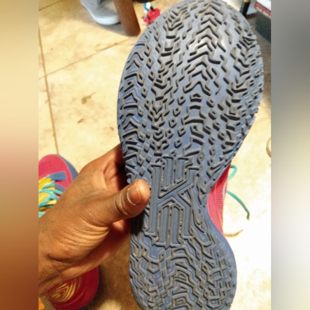 Kyrie's basketball shoes red blue and yellow size 9.5